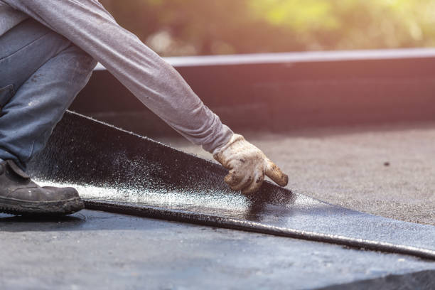 Professional Basement Waterproofing technician working in Belleville, PA